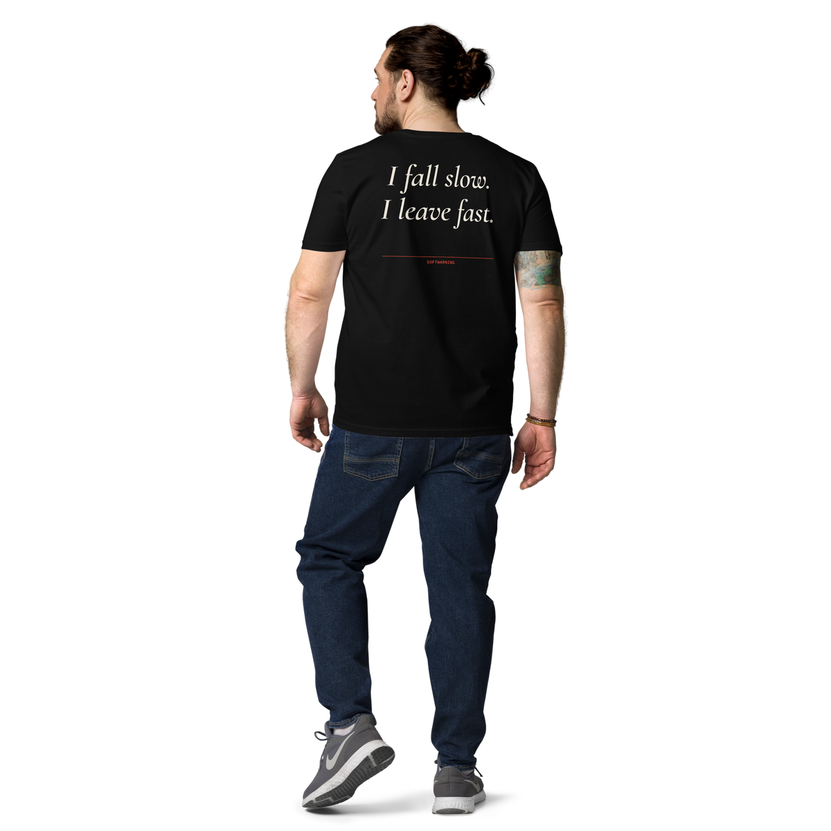 Man wearing the I Fall Slow. I Leave Fast T-shirt in black, back view