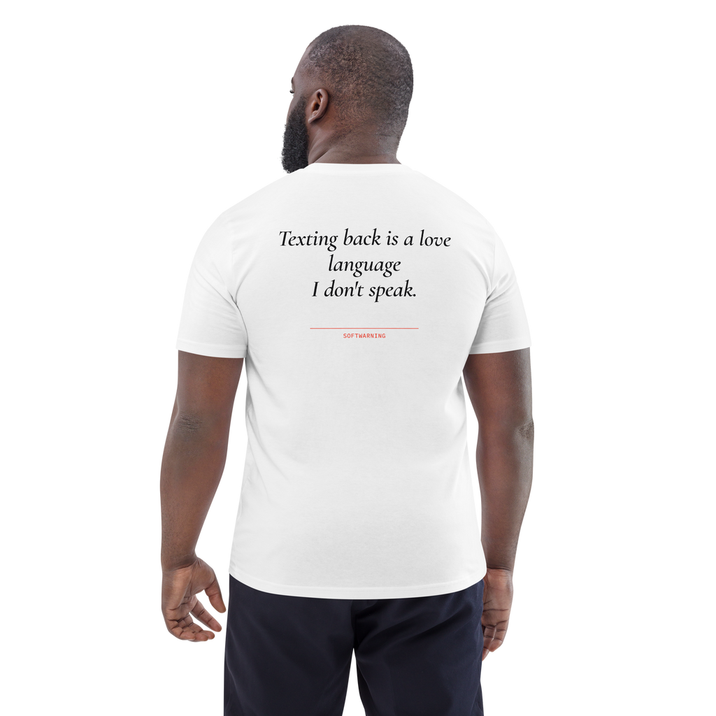 Man wearing the Texting Back Is a Love Language I Don’t Speak T-shirt in white, back view