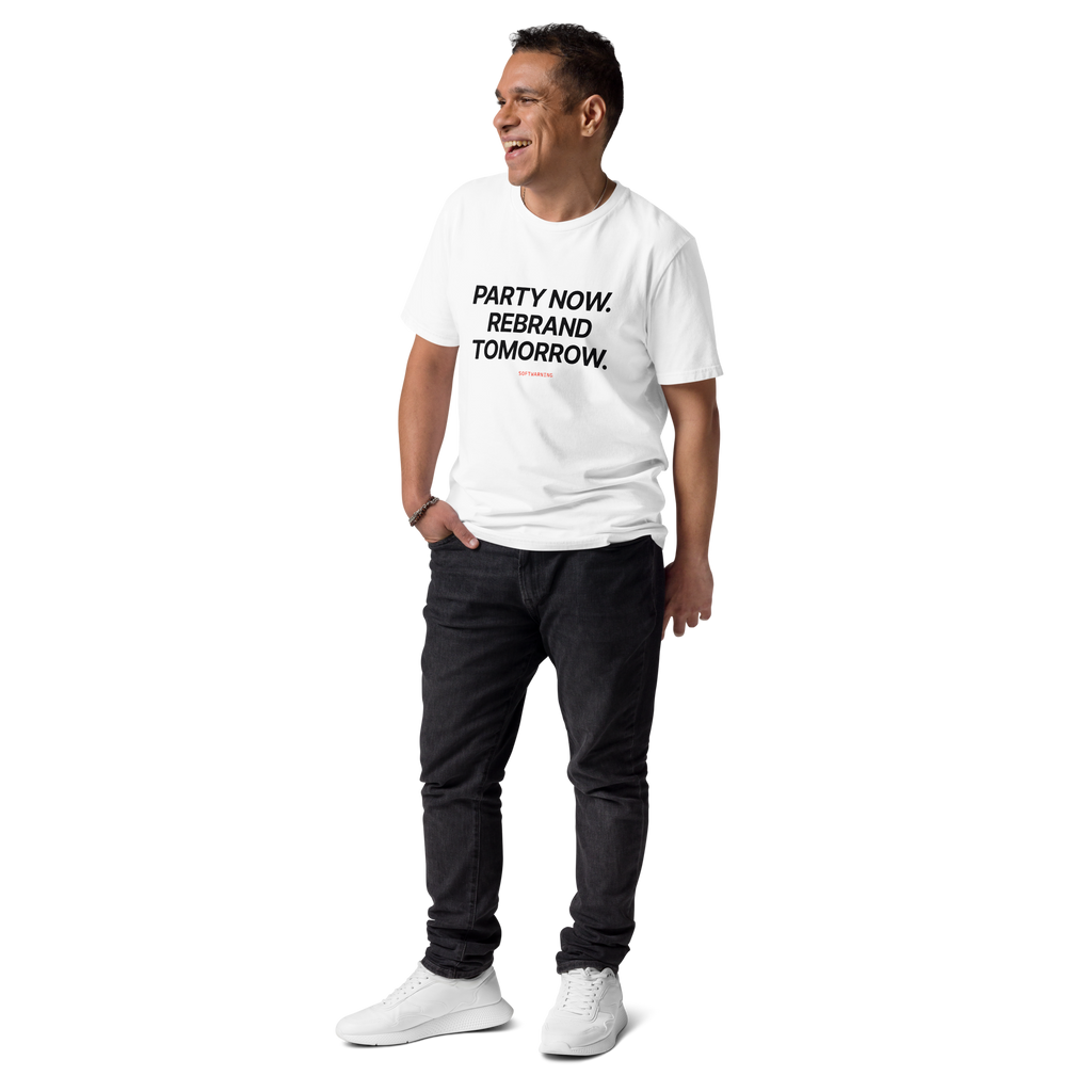 Man wearing the Party Now. Rebrand Tomorrow T-shirt in white, front view