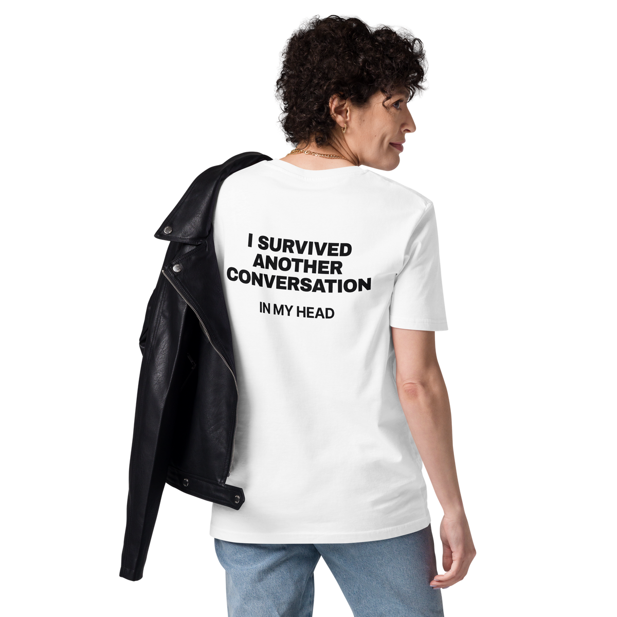 Woman wearing the I Survived Another Conversation in My Head T-shirt in white, back view