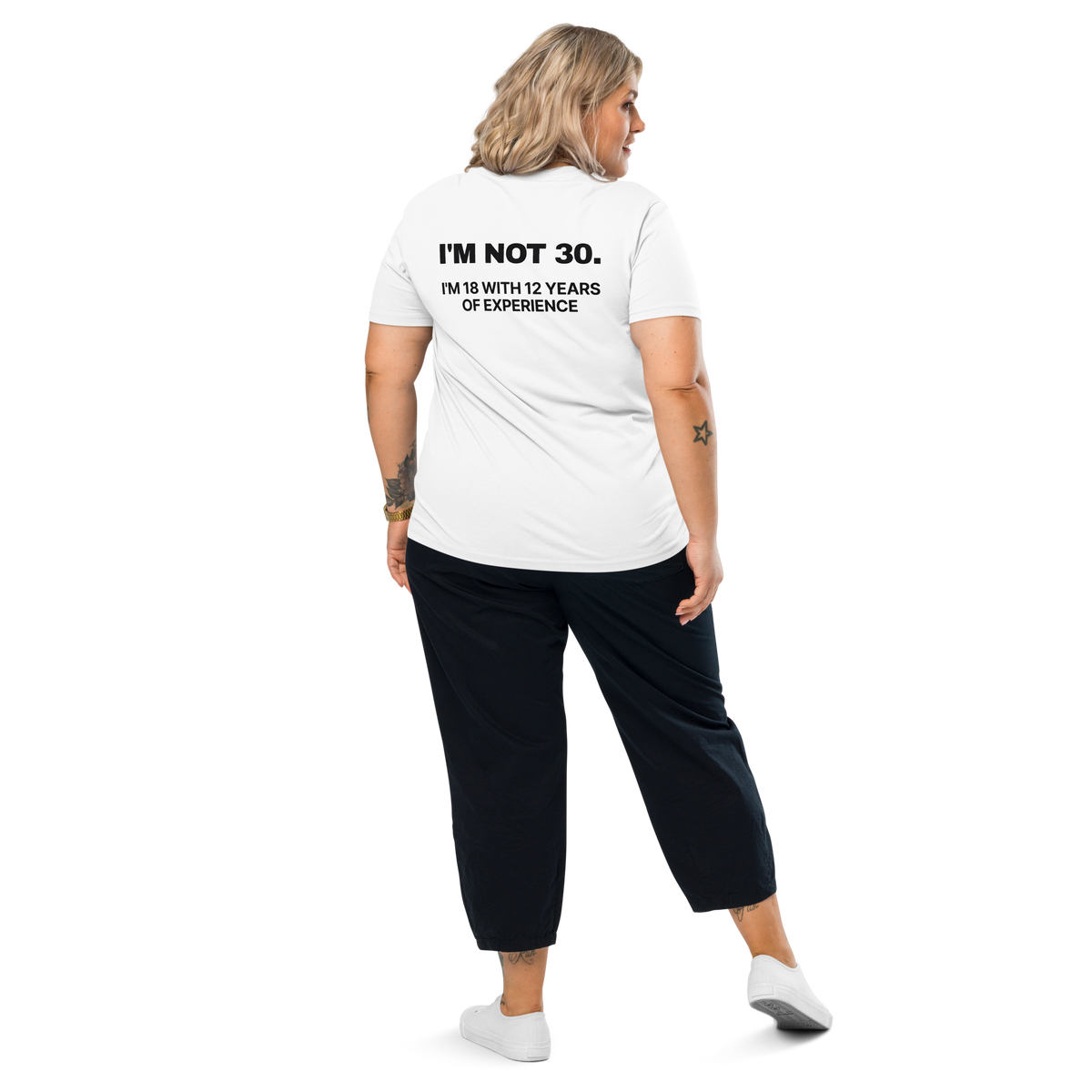 Woman wearing the I’m Not 30. I’m 18 with 12 Years of Experience T-shirt in white, back view