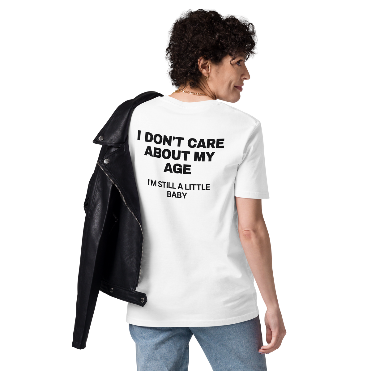 Woman wearing the I Don’t Care About My Age. I’m Still a Little Baby T-shirt in white, back view