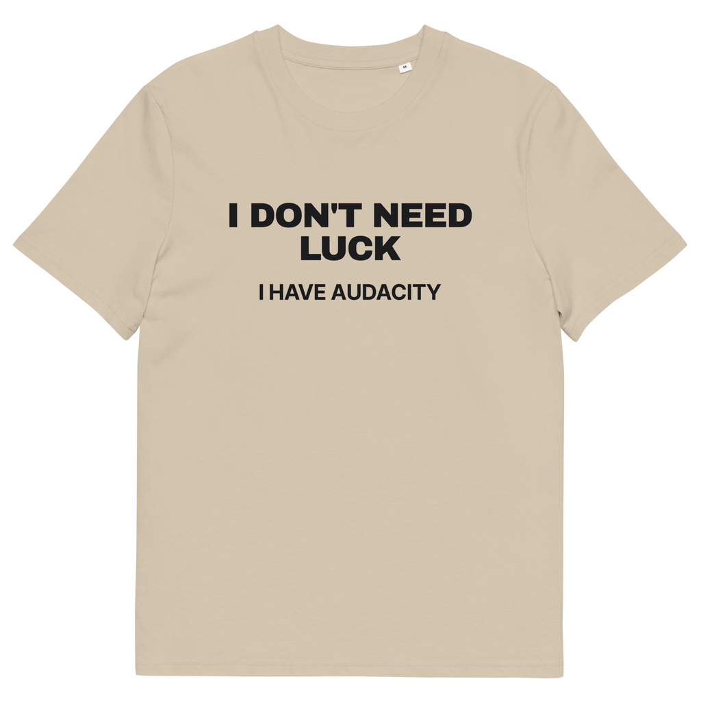 Desert Dust product view of the I Don’t Need Luck. I Have Audacity T-shirt, front