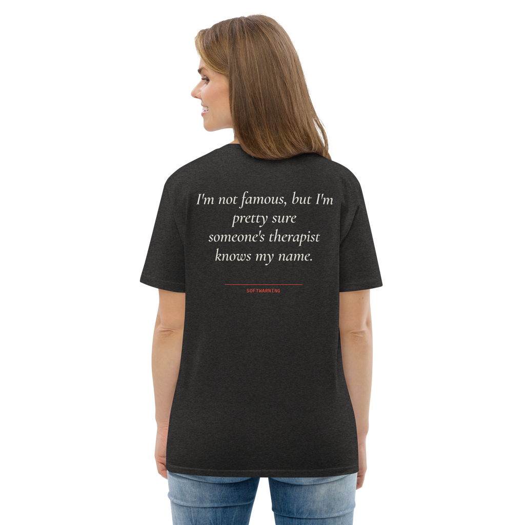 Woman wearing the I’m Not Famous but I’m Pretty Sure Someone’s Therapist Knows My Name T-shirt in dark heather grey, back view