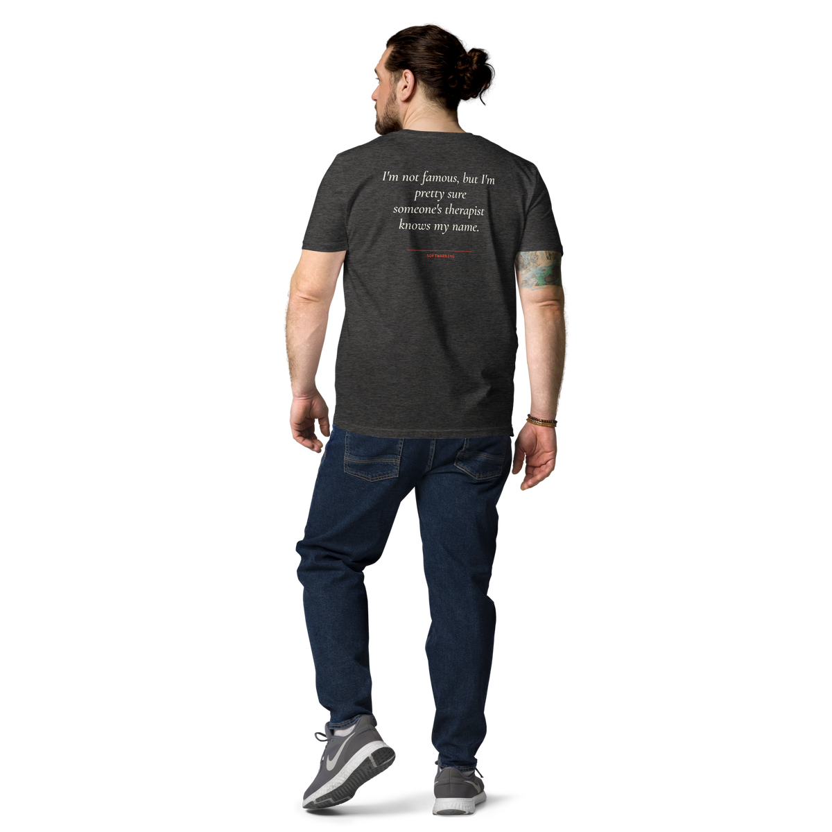 Man wearing the I’m Not Famous but I’m Pretty Sure Someone’s Therapist Knows My Name T-shirt in dark heather grey, back view
