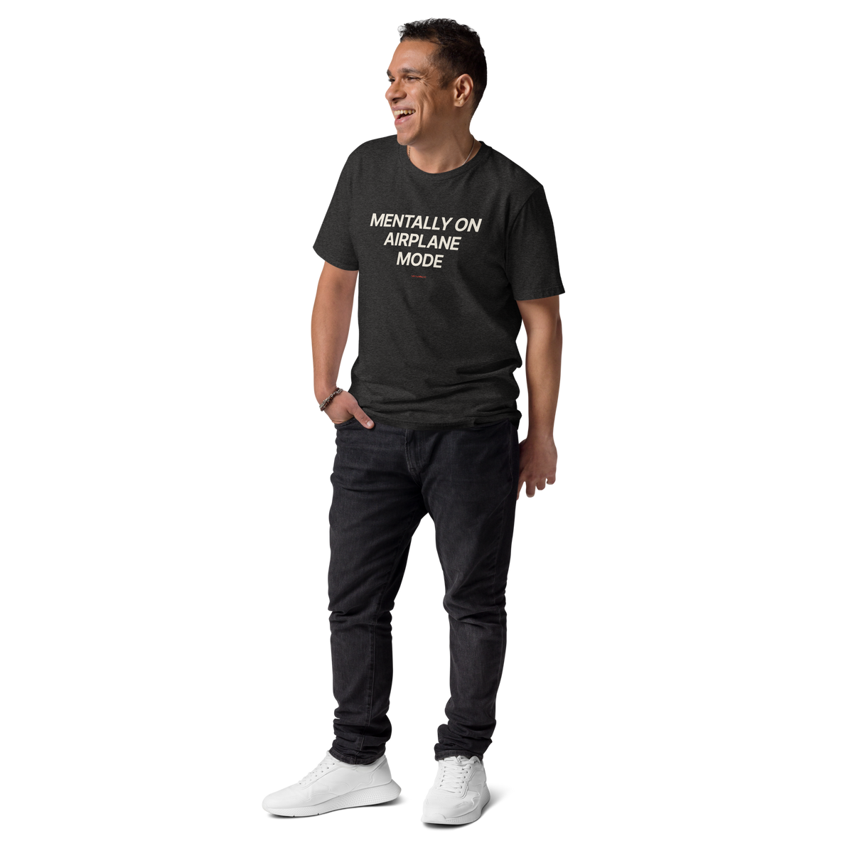 Man wearing the Mentally on Airplane Mode T-shirt in dark heather grey, front view